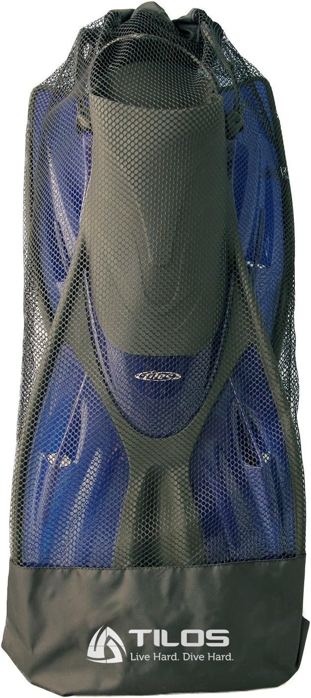 Diver carrying Tilos Getaway Wide Toe Box Snorkeling Fins fins out of the water