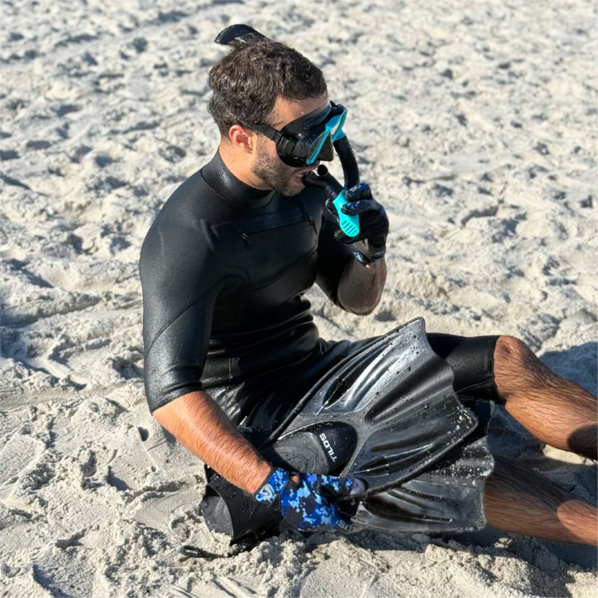 Snorkeler using the Tilos 100% Dry Snorkel at the surface
