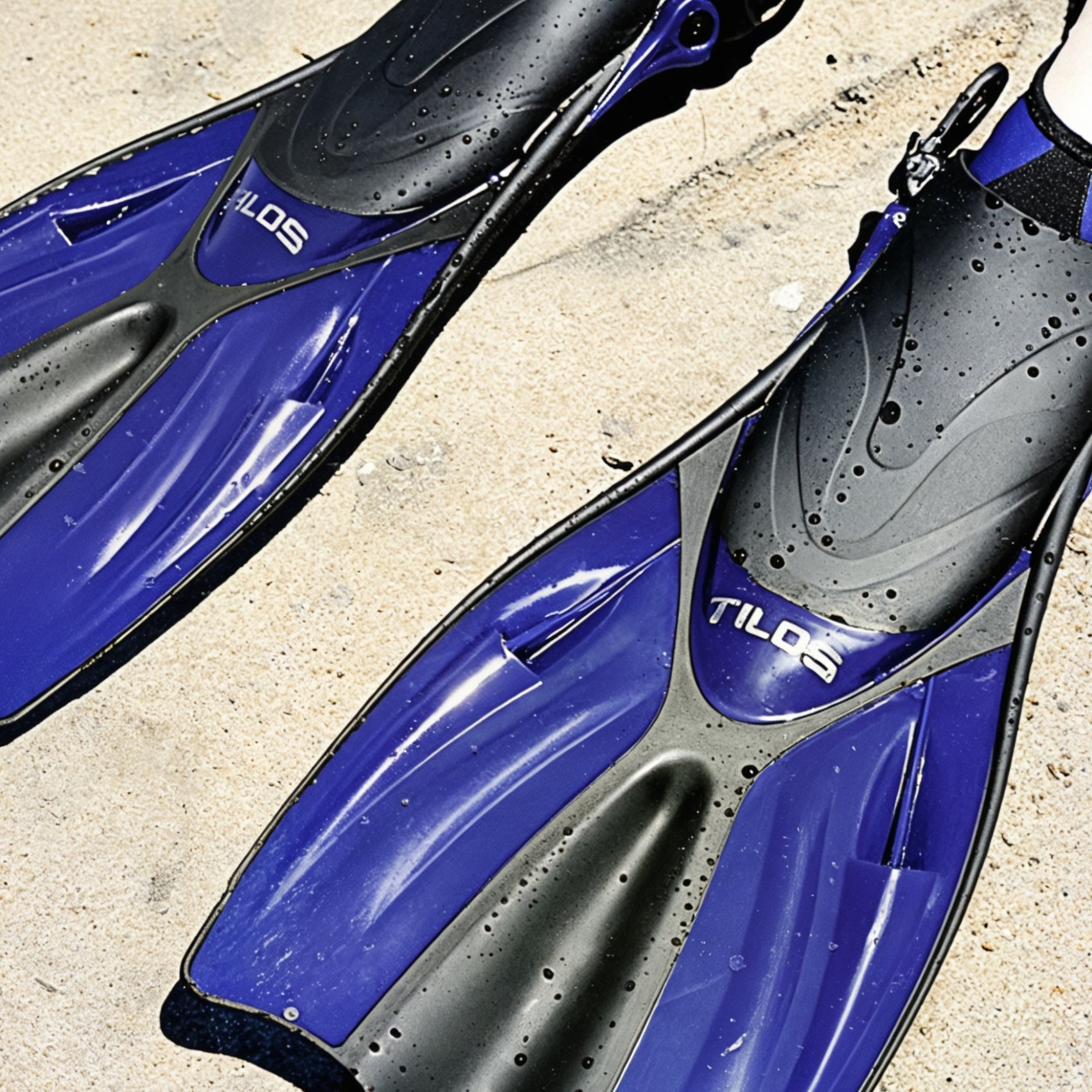 Tilos Getaway Wide Toe Box Snorkeling Fins in blue — open heel fin, front view showing blade and foot pocket