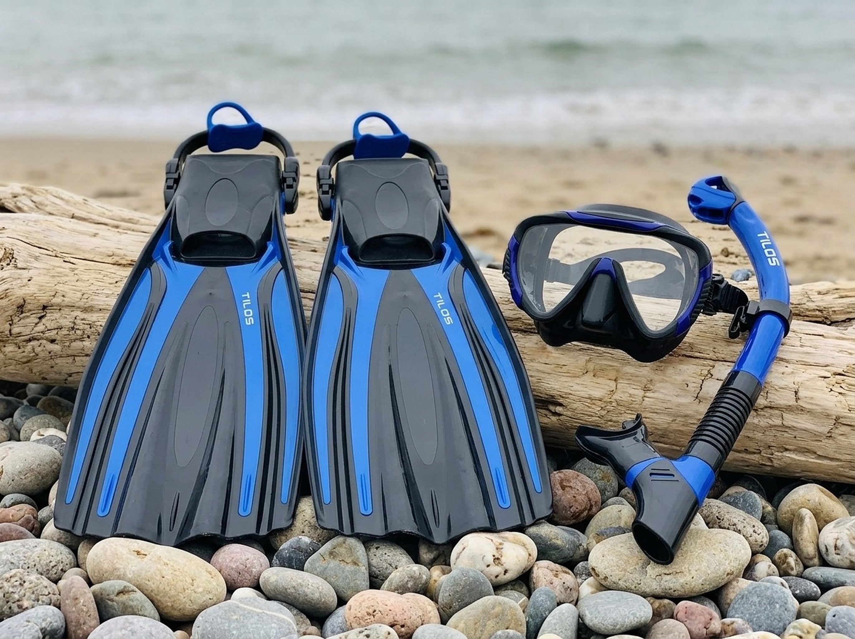 Snorkeler using the Tilos Morphi Mask, Orion Snorkel and Forager Fins Set in Black/Blue — driftwood