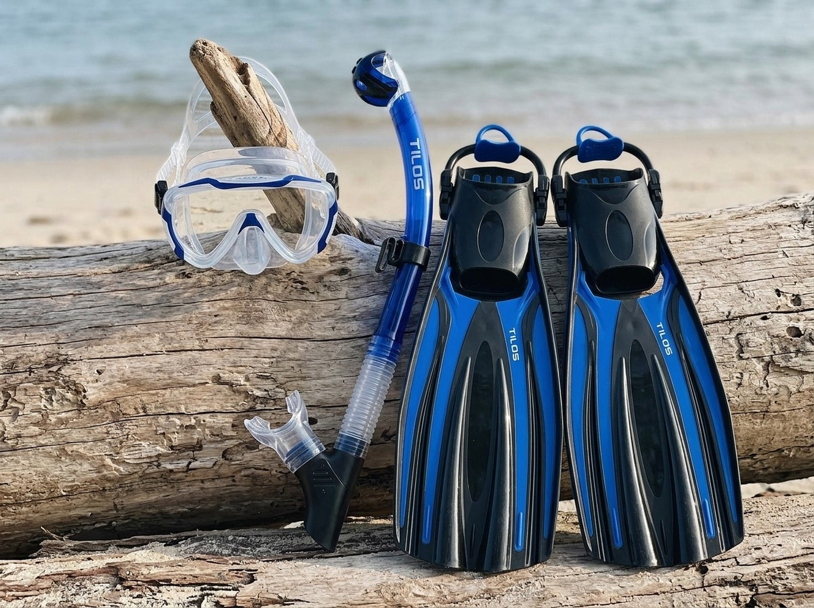 Snorkeler using the Tilos Morphi Mask, Orion Snorkel and Forager Fins Set in Blue — driftwood