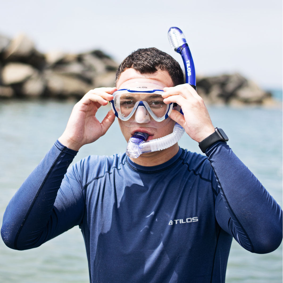 Tilos Men's 6oz Long Sleeve Rash Guard, Heather Marine in teal blue — UPF sun protection top