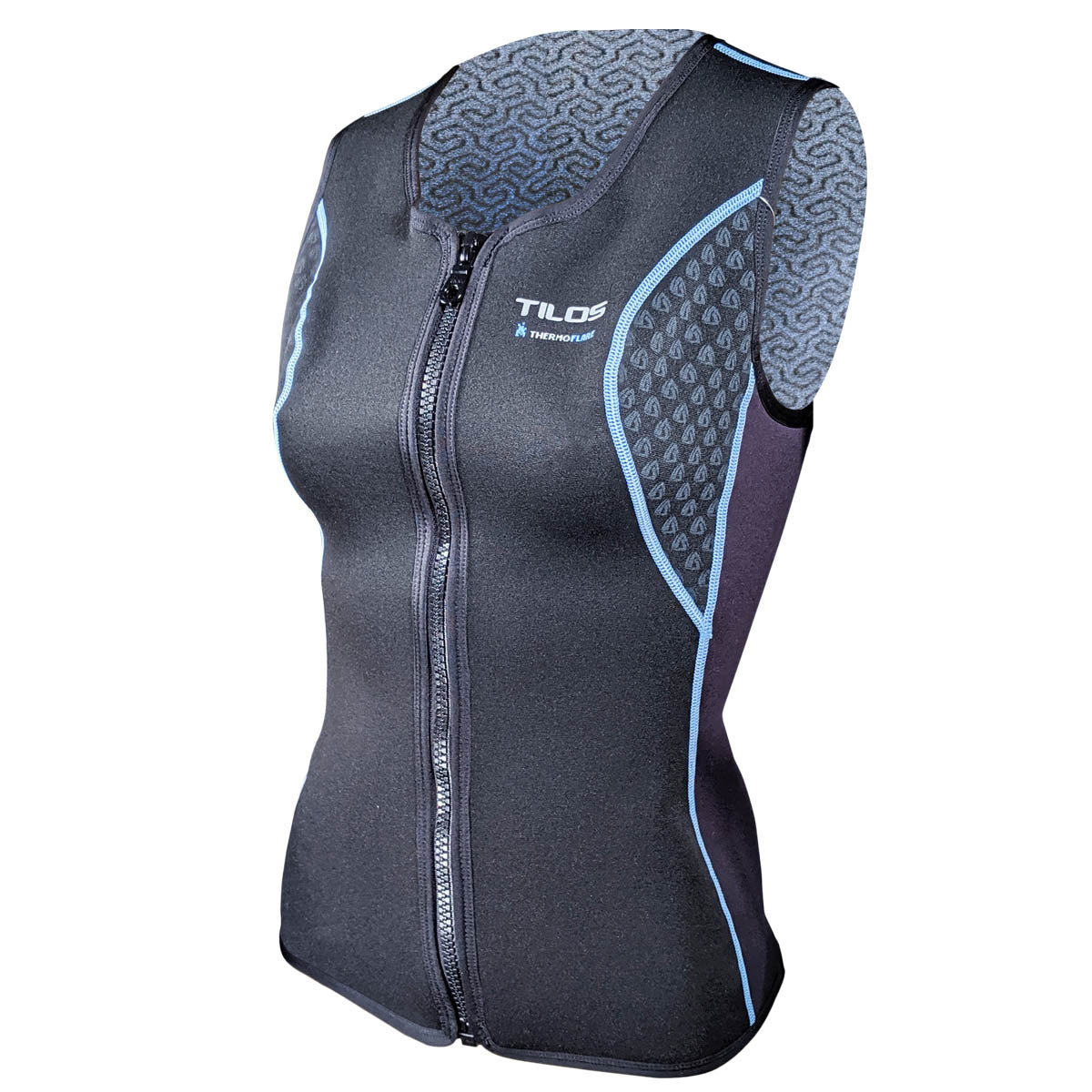 Tilos 1mm Ladies Thermoflare Zip Vest, three-quarter exterior view showing the blue accent piping and honeycomb thermal panels