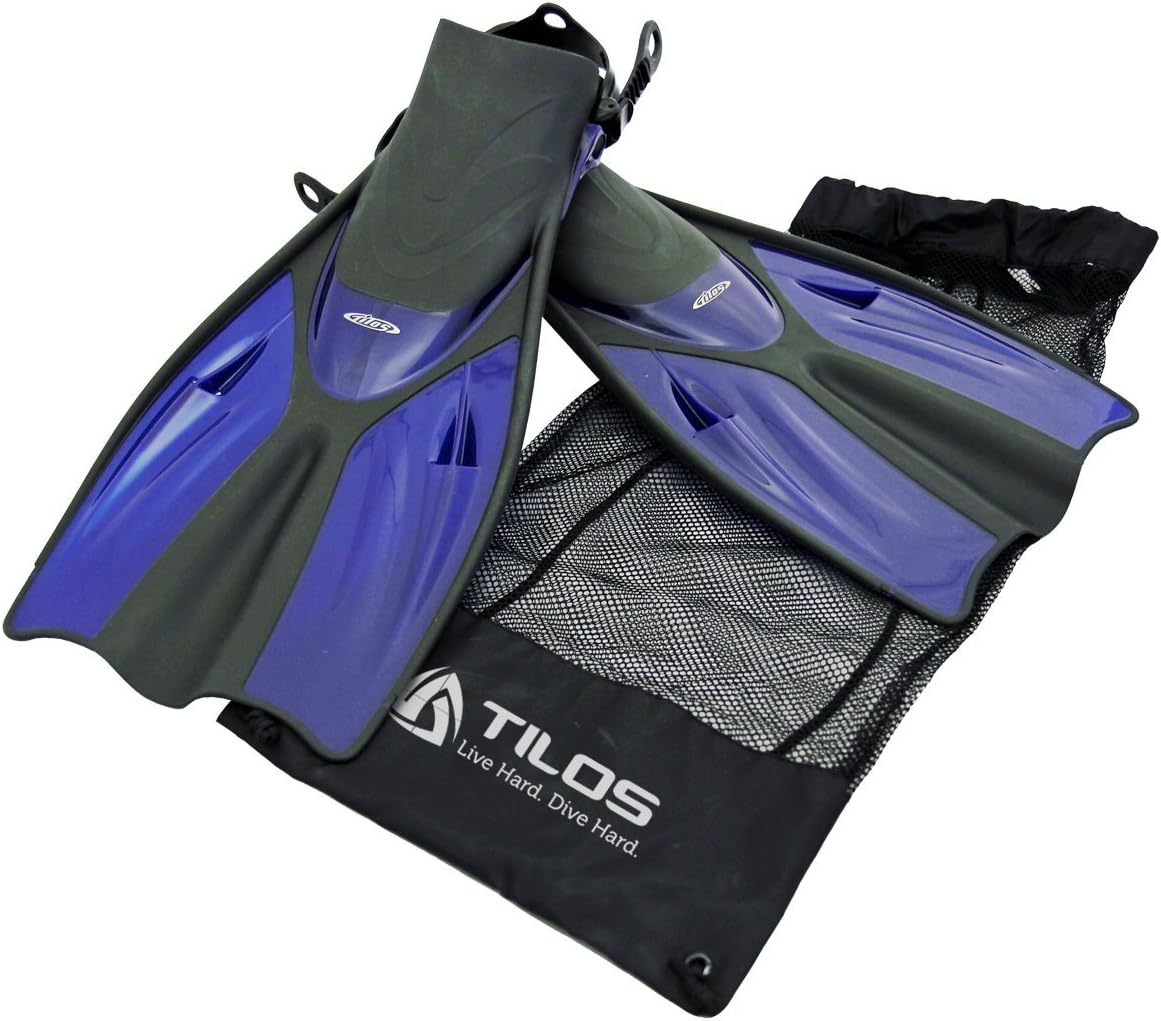 Diver carrying Tilos Getaway Wide Toe Box Snorkeling Fins fins out of the water