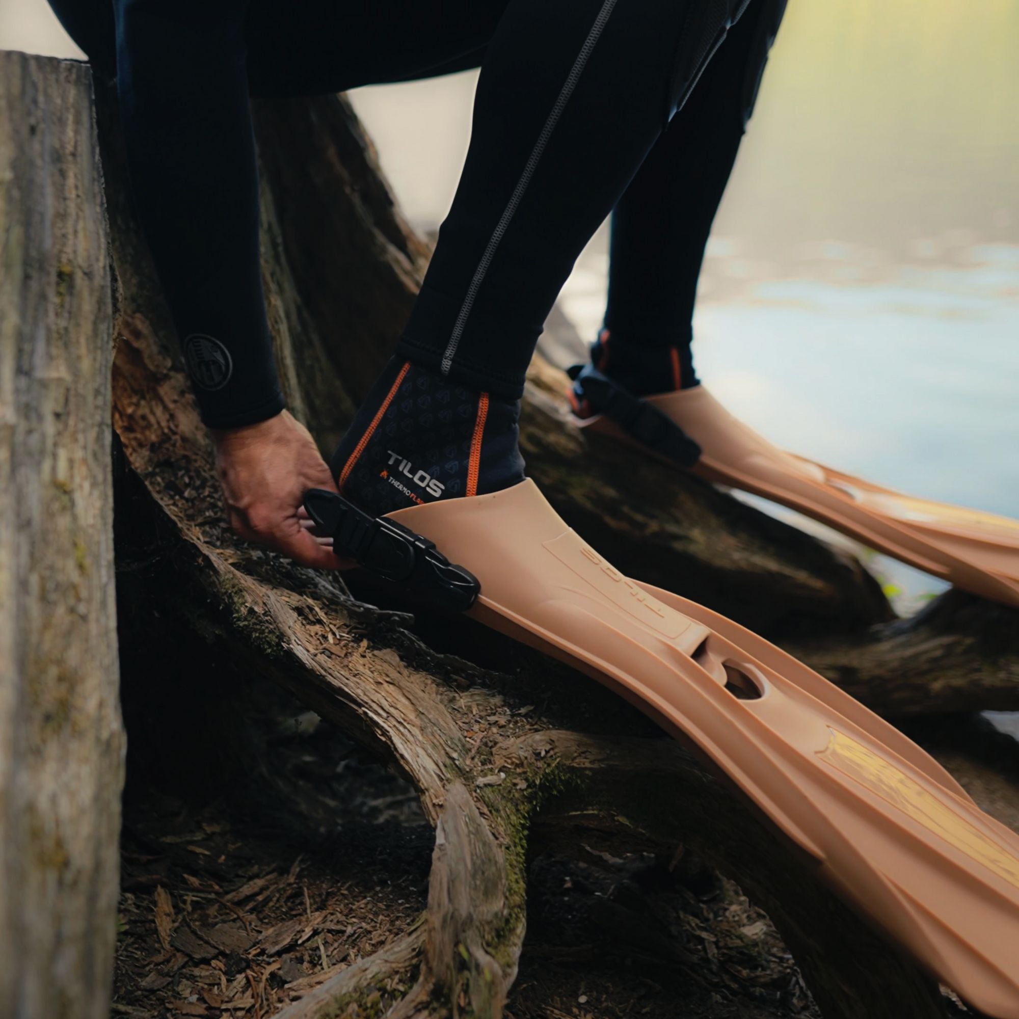Tilos Technix Open Heel Travel Fins — side view showing blade profile