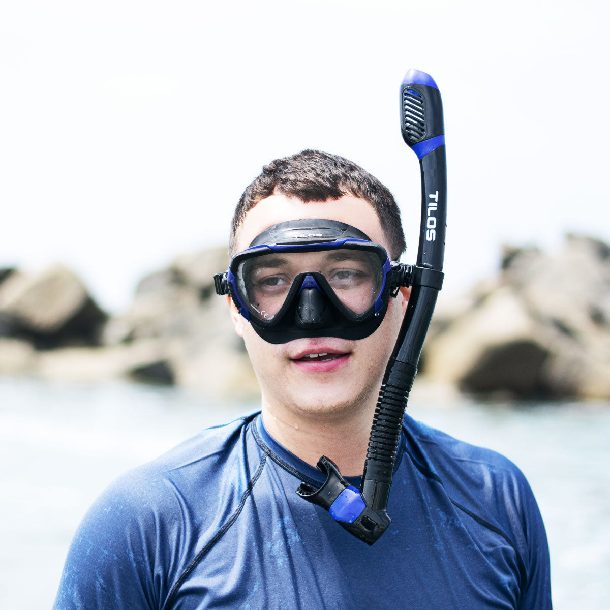 Snorkeler using the Tilos Morphi Mask with Diver Sleek Snorkel Combo Set set at the surface