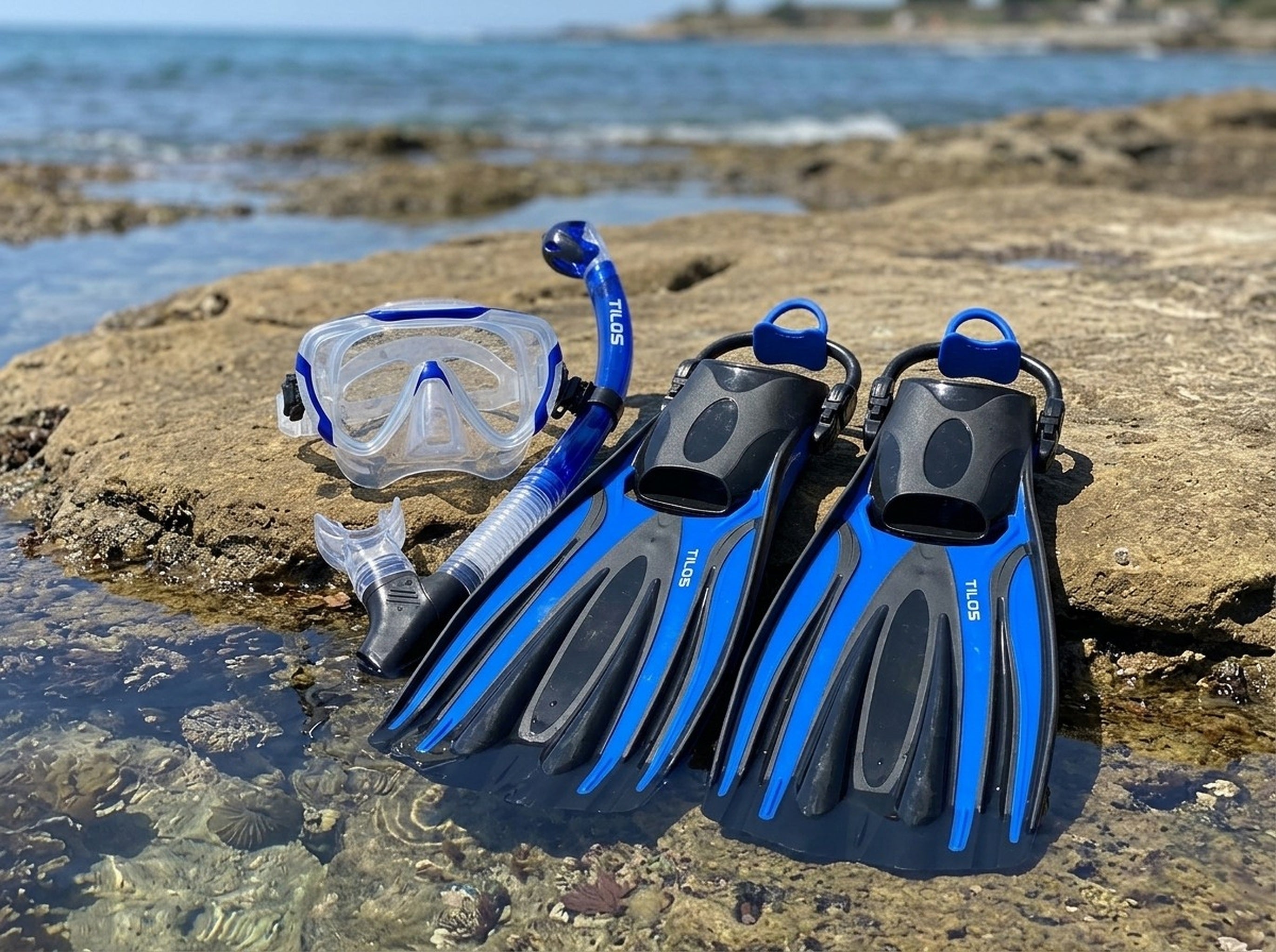Snorkeler using the Tilos Morphi Mask, Orion Snorkel and Forager Fins Set in Blue — tidepool