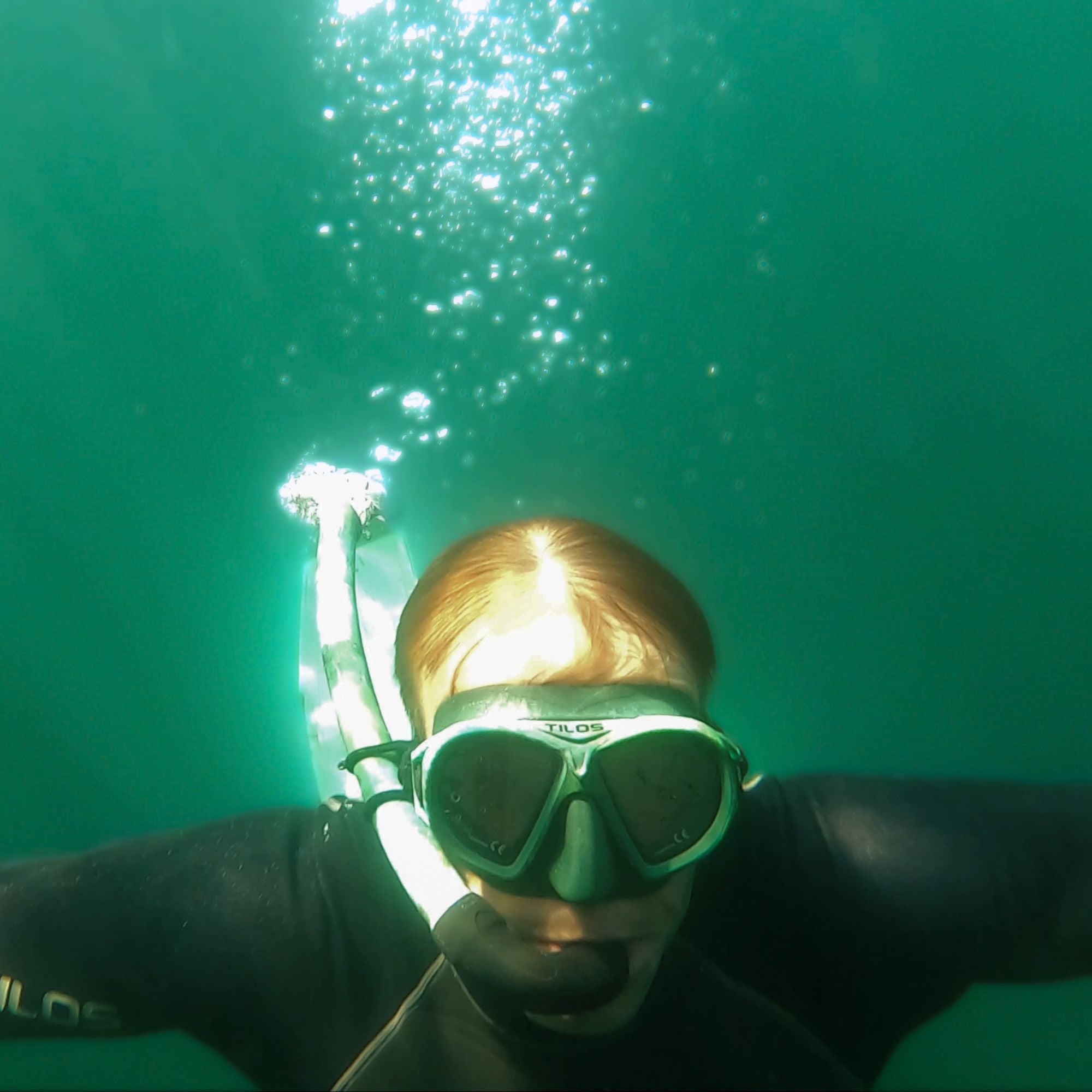 Tilos Spawn Camo Open-Top Snorkel — front view showing lens and silicone skirt